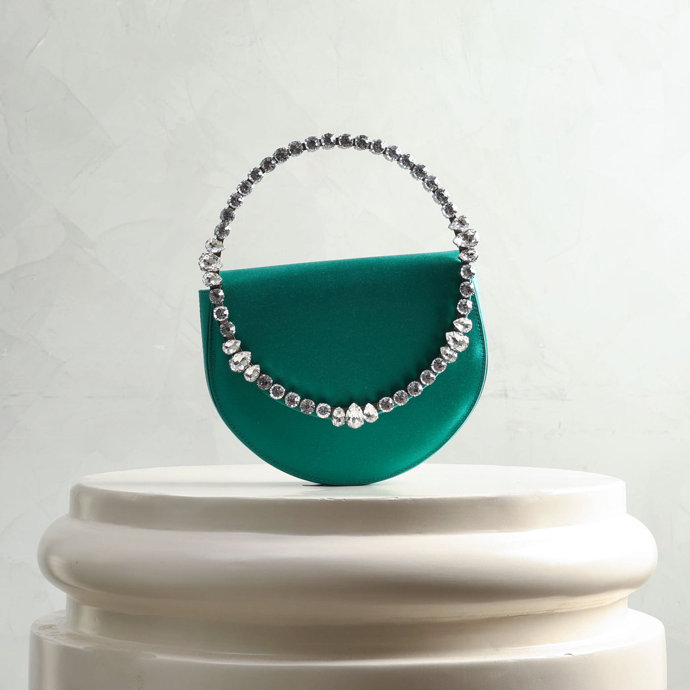 LALINGI Lily Clutch emerald green-hued satin and a brass and silver plating with multi crystal stones and front opening 