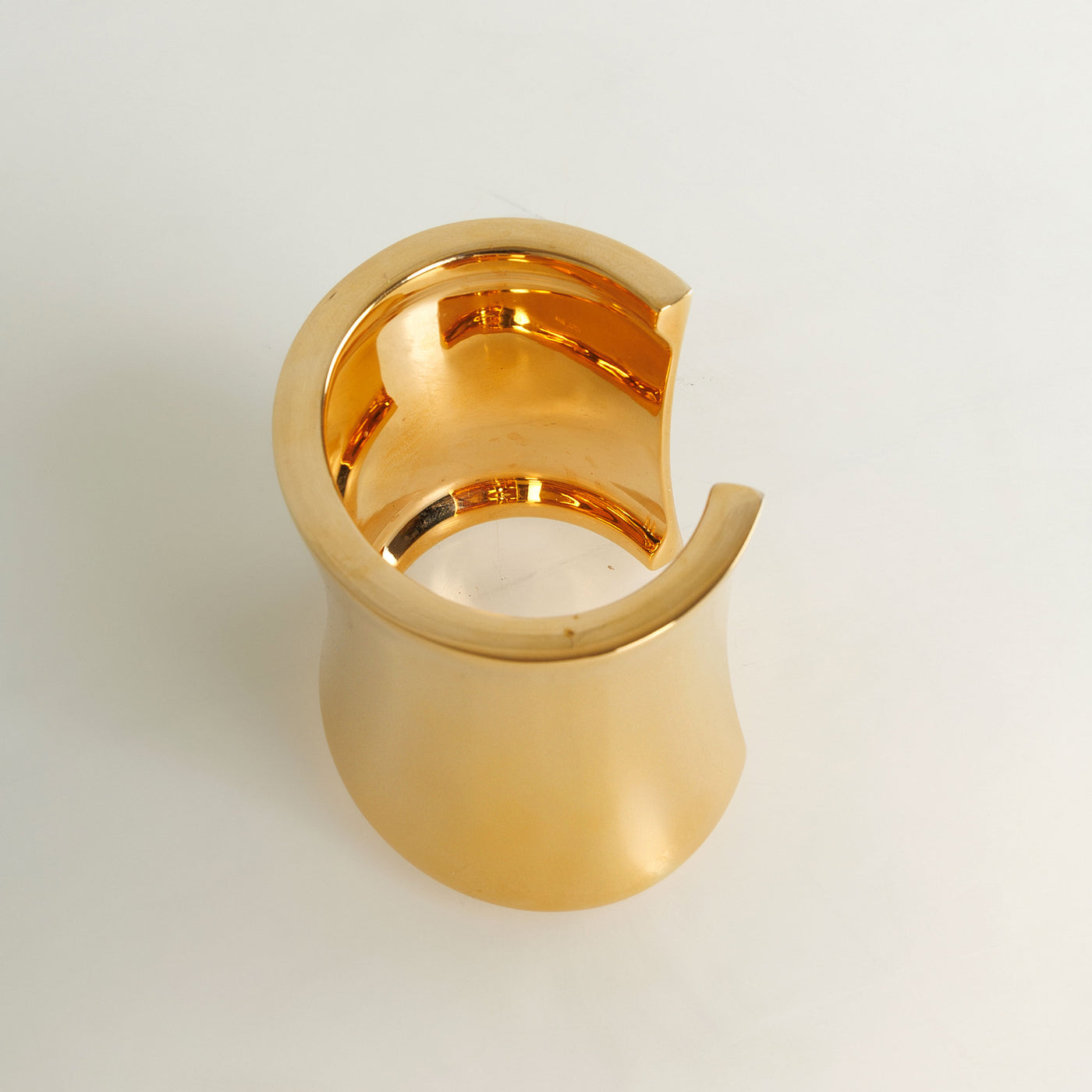 SAINT LAURENT gold curved polished cuff