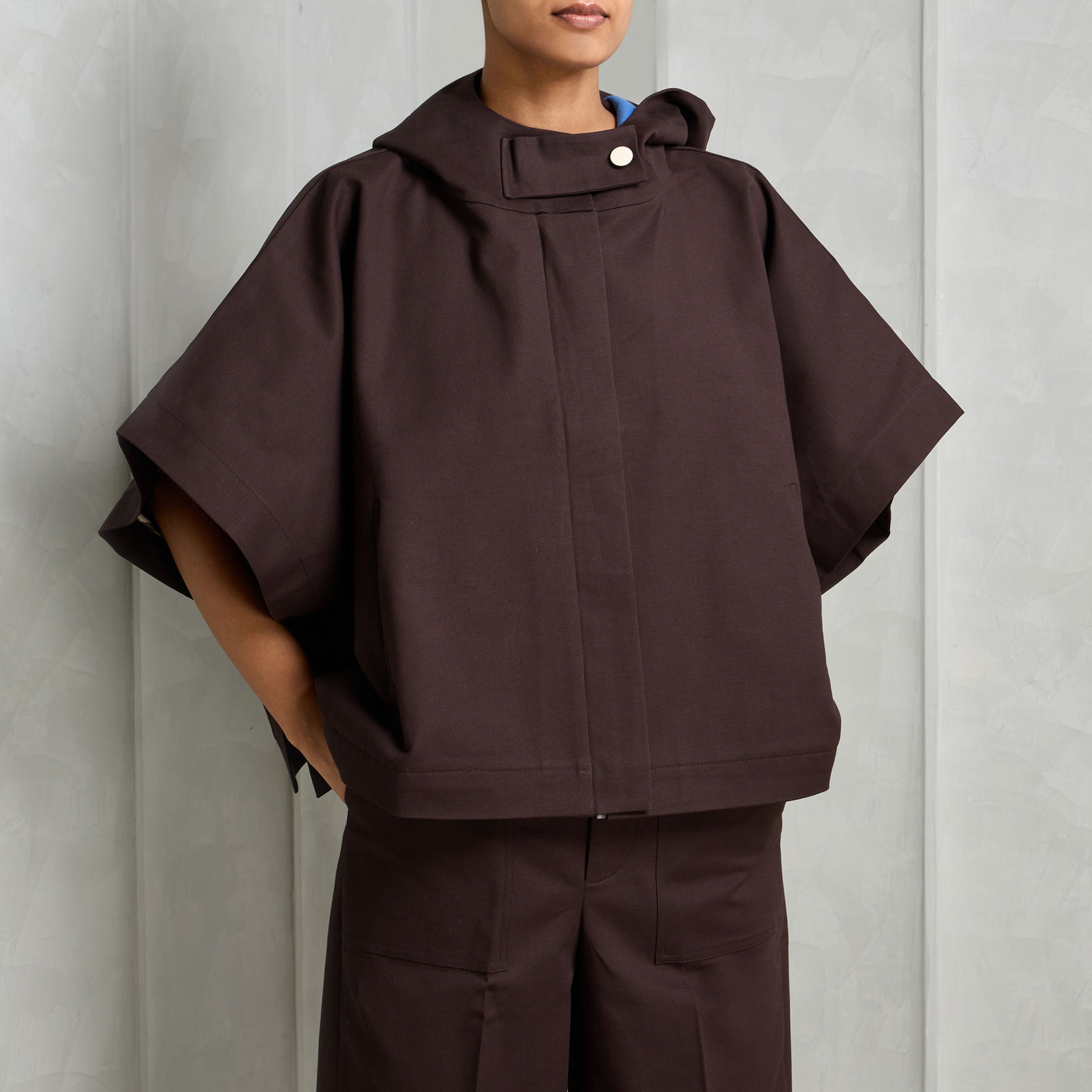 BHAANE hooded postmaster poncho