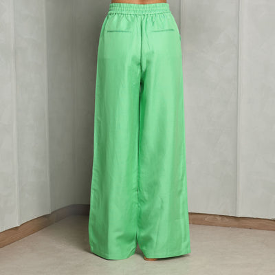 ACLER bonython pants green elastic waist band, adjustable drawstring and inseam pockets, this pant adorns a fitted waist silhouette flare at the hem