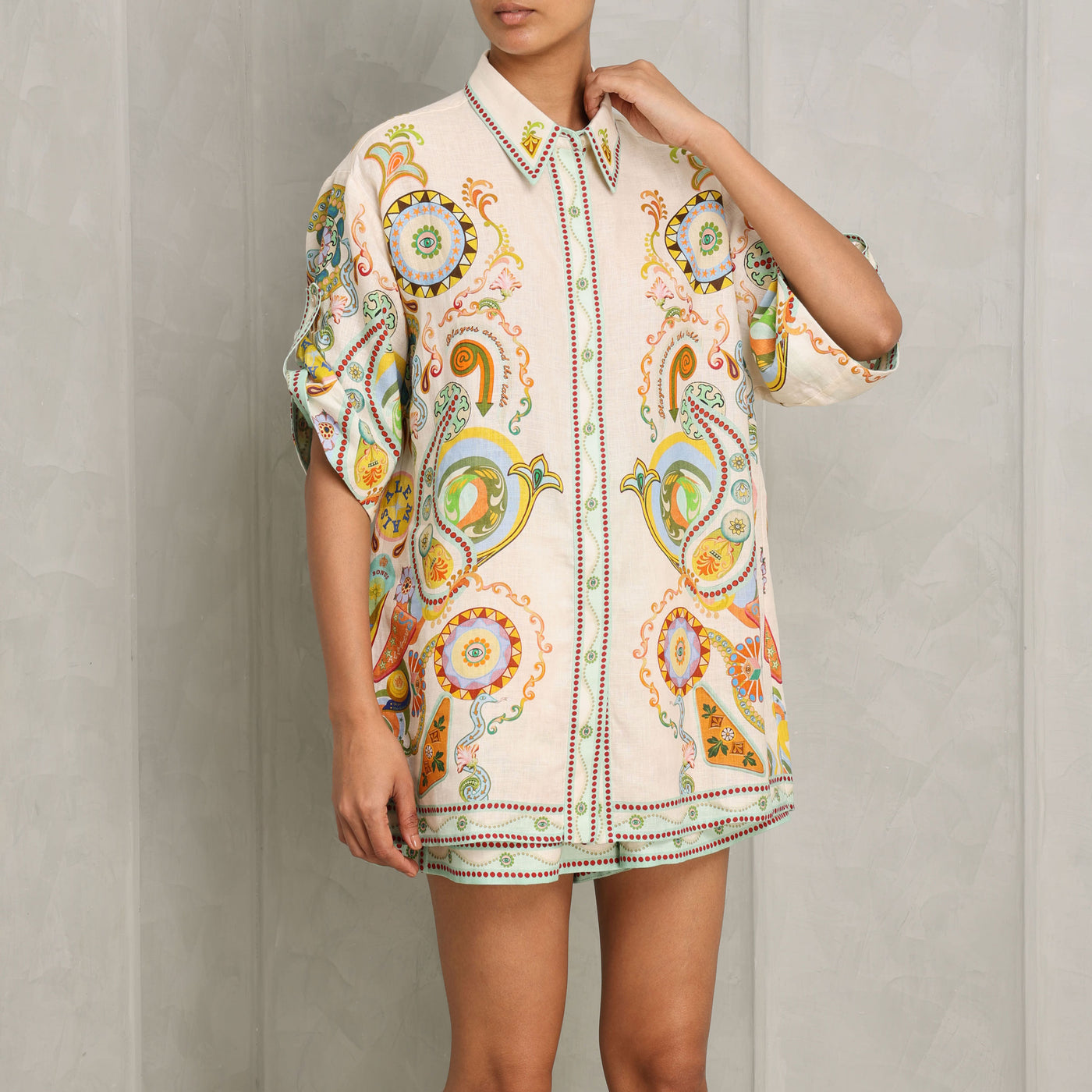 ALEMAIS pinball collared shirt linen multicoloured pointed stand collar, a concealed placket with self-covered eyelet buttons, and a rolled sleeve with button and tab