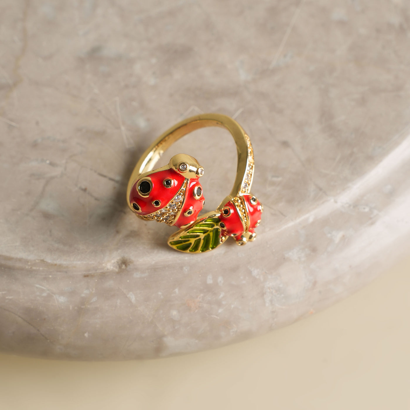 Red lady bug design gold ring at Le Mill