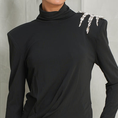 silver embellished black colored top by area at le mill