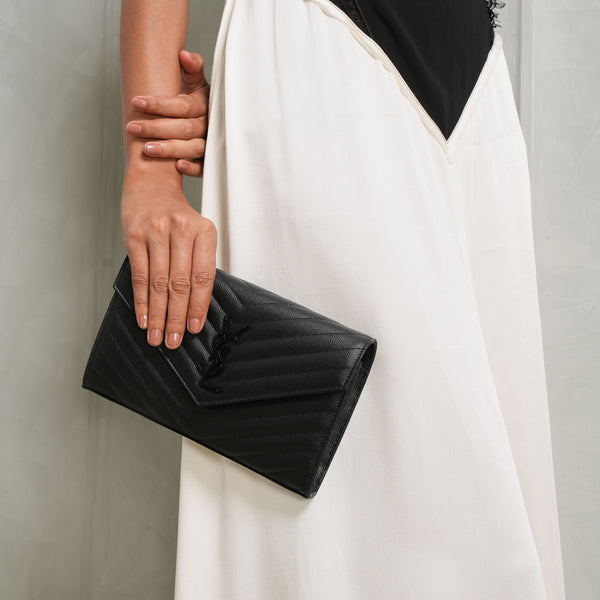 ysl hand wallet