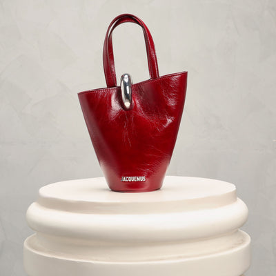 red bambola bag from jacquemus at le mill