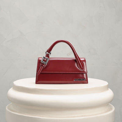 red handbag with buckle jacquemus le mill