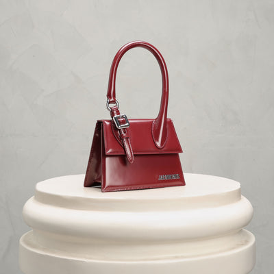 red handbag from jacquemus at le mill