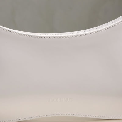 white bisou perle bag from jacquemus