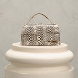 jacquemus bambino handbag with snake skin pattern 