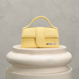 yellow bambino handbag jacquemus 