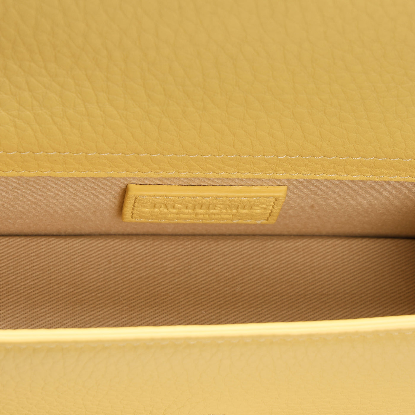 textured yellow color bambino bag jacquemus le mill