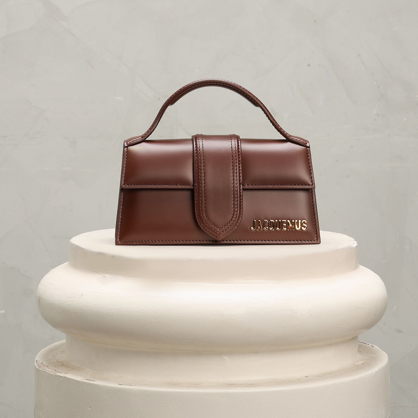 brown bambino jacquemus bag 