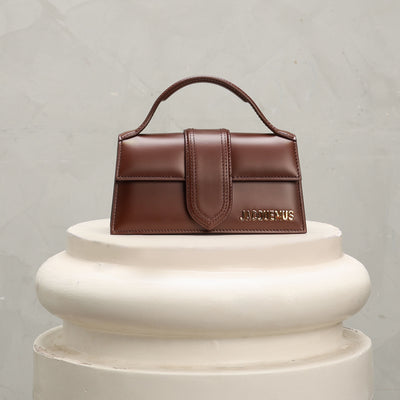 brown bambino jacquemus bag 