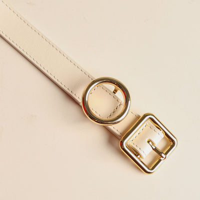 white belt with golden buckle from jacquemus at le mill