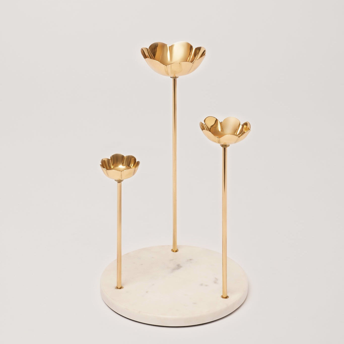 Candle holder of golden color  