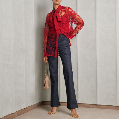 JACQUEMUS flared high-waisted blue jeans