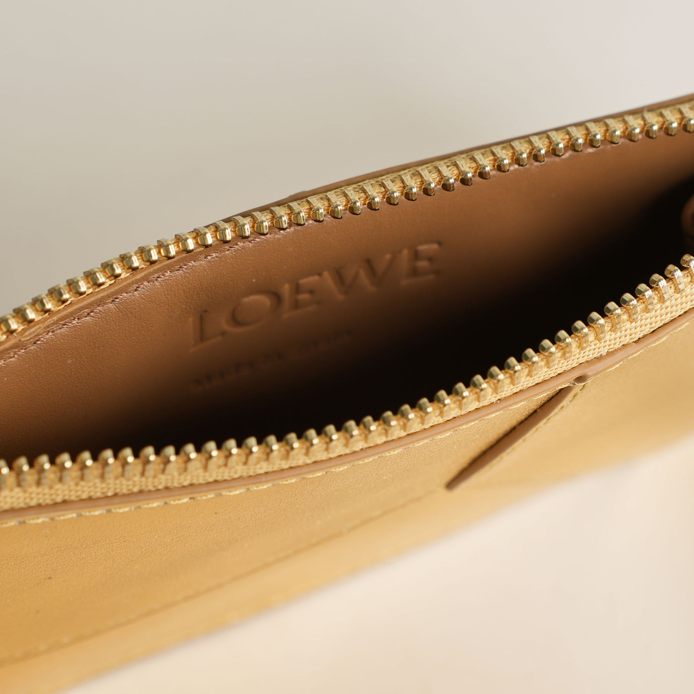 LOEWE gold puzzle coin leather cardholder with zipper