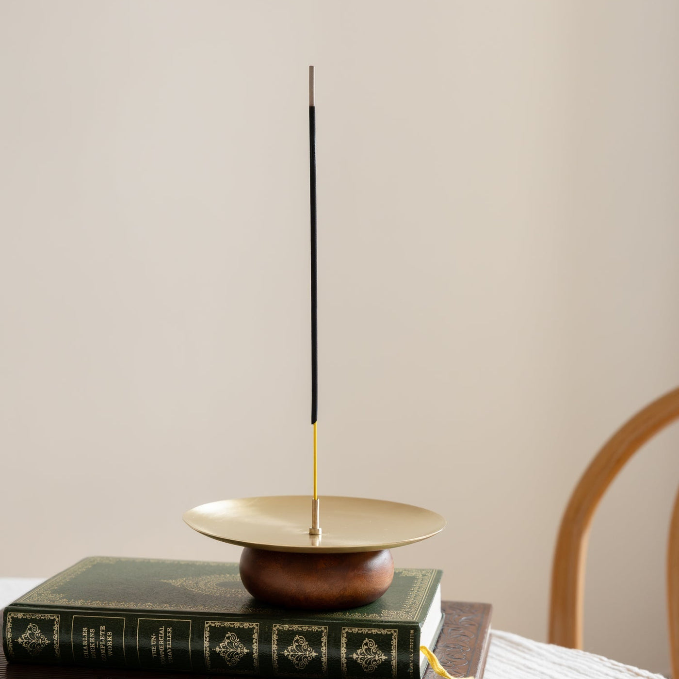 round incense stick holder in golden color by fleck at le mill