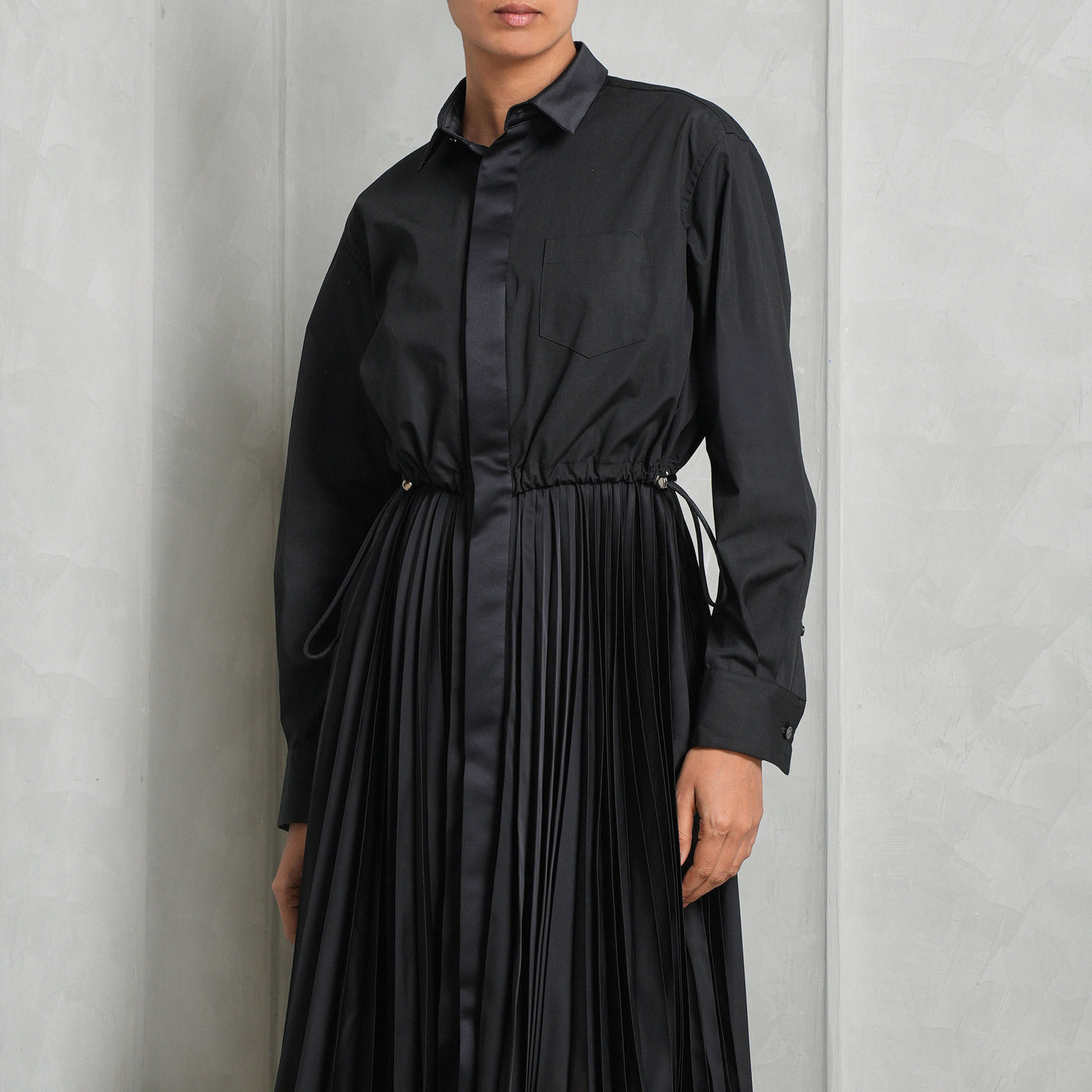 SACAI Black Pleated Midi Dress with buttoned cuffs & a drawcord
