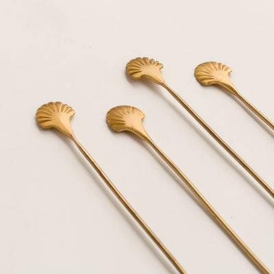 golden color stirrers by fleck at Le Mill