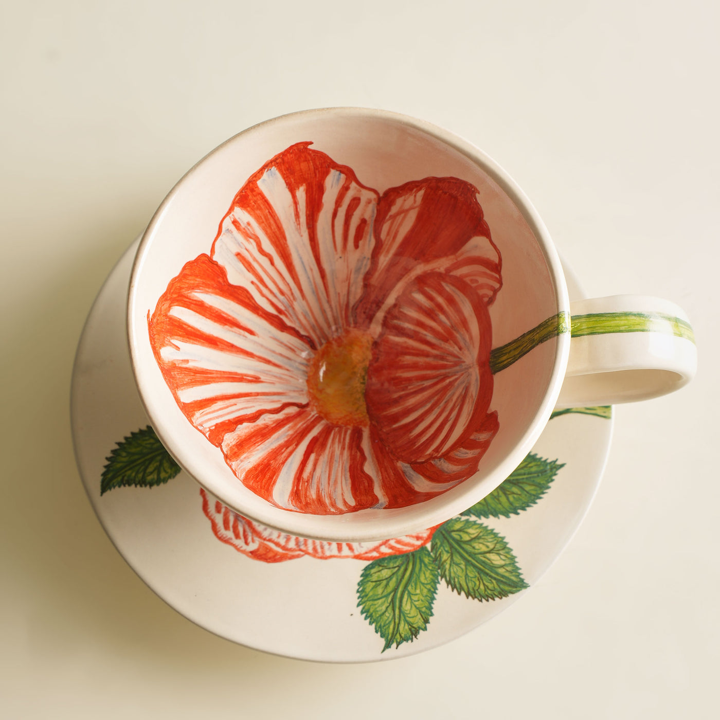 KHANOOM tea cup and saucer tulip graceful tulip motif with soft white backdrop