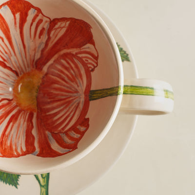 KHANOOM tea cup and saucer tulip graceful tulip motif with soft white backdrop