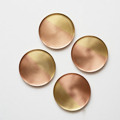 round brass coasters by fleck at Le Mill