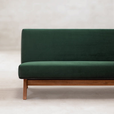 Phantom Hands Upholstered Armless Sofa Green