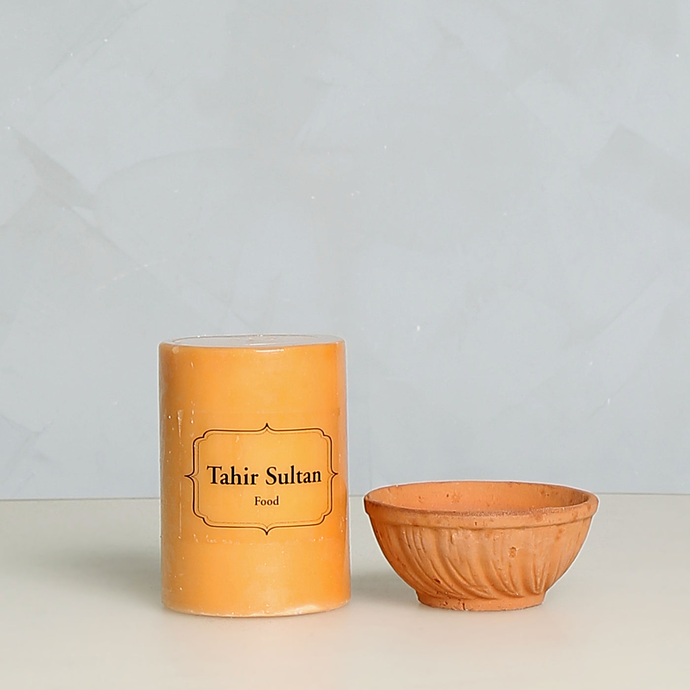 Tahir Sultan Assorted Candle with a cup 